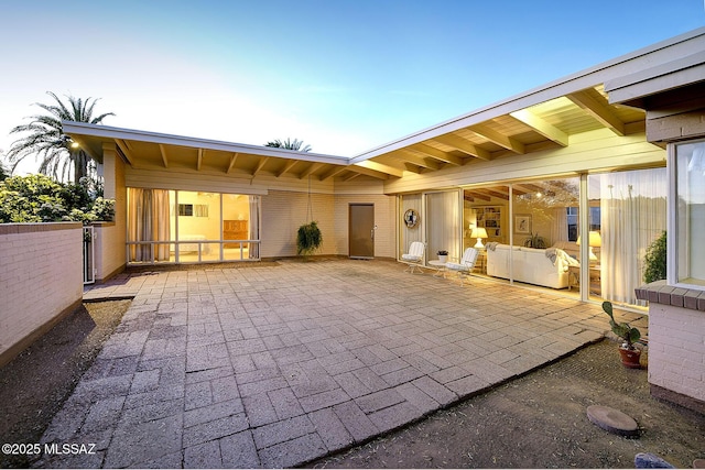 back of house with a patio area