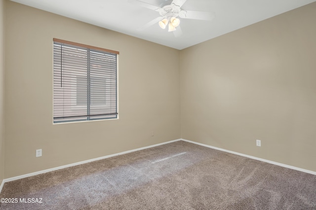 carpeted empty room with ceiling fan