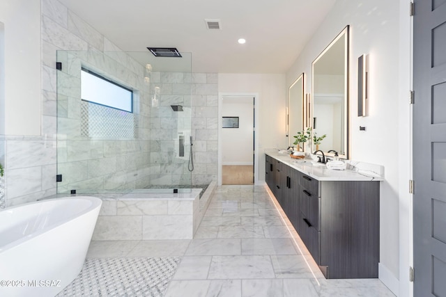 bathroom featuring independent shower and bath and vanity