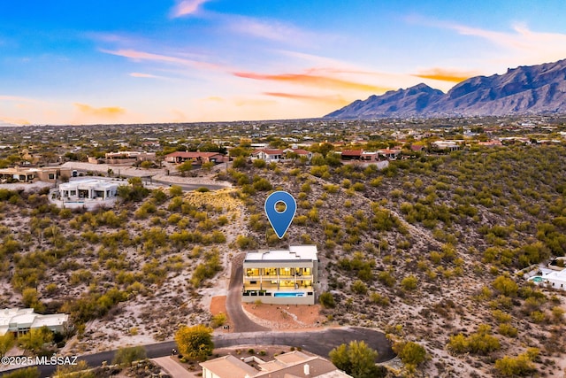 aerial view at dusk with a mountain view