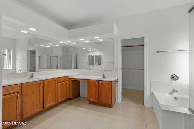 bathroom featuring vanity and plus walk in shower