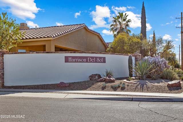 view of community sign