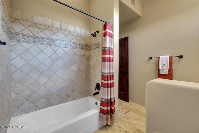 bathroom featuring shower / tub combo with curtain