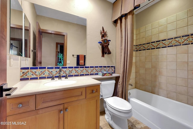 full bathroom with tasteful backsplash, vanity, shower / bath combo, and toilet