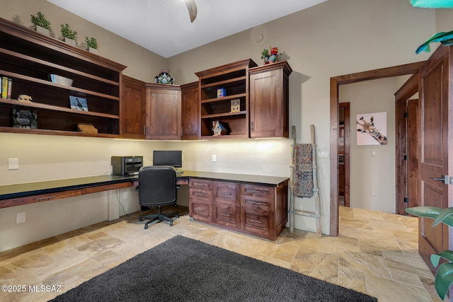 home office featuring built in desk