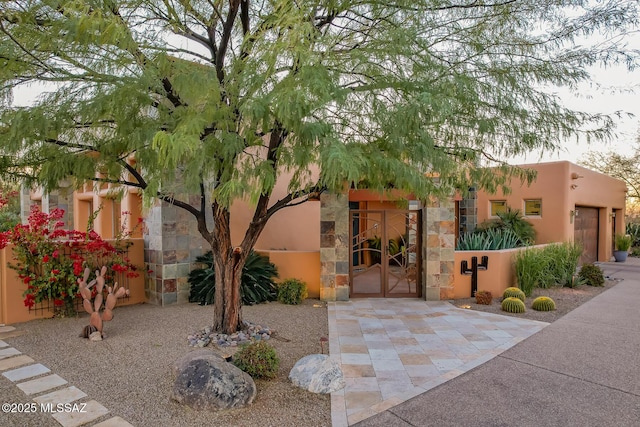 view of front of property featuring a garage