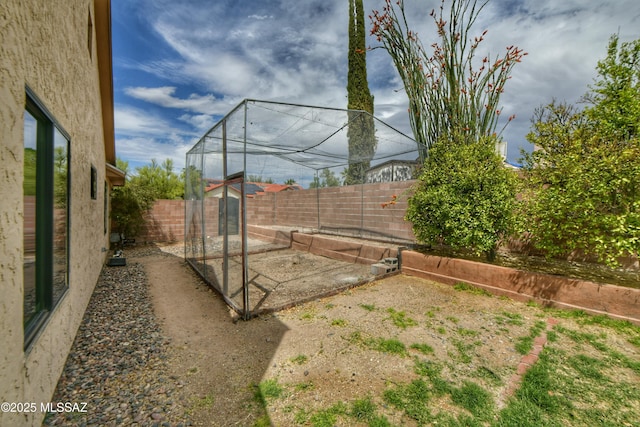 view of yard with a fenced backyard