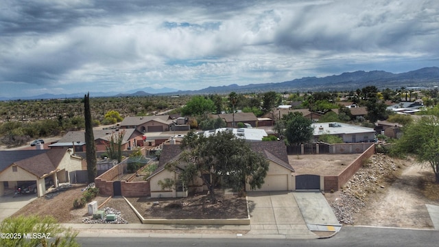 birds eye view of property featuring a mountain view and a residential view