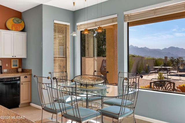 dining area featuring a mountain view