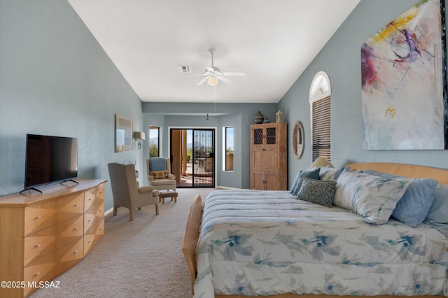 bedroom featuring ceiling fan, lofted ceiling, carpet, and access to outside