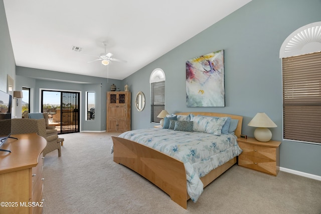 carpeted bedroom with vaulted ceiling, access to outside, and ceiling fan