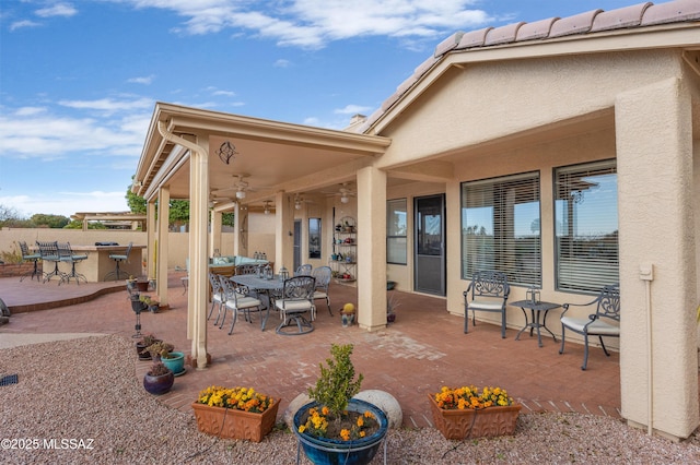 view of patio / terrace featuring ceiling fan