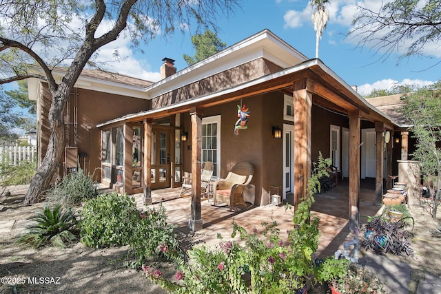 back of house featuring a patio