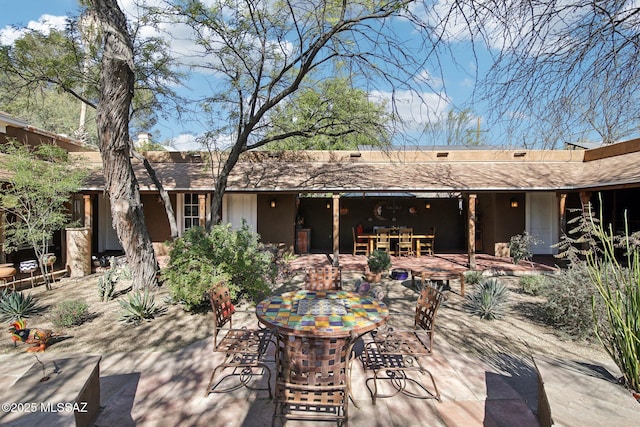 back of house featuring a patio