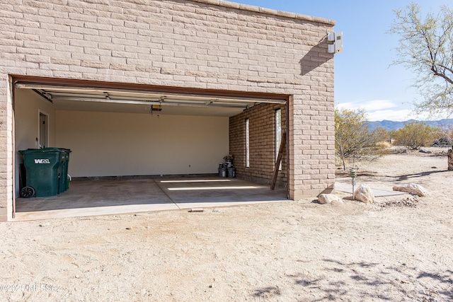 garage featuring a mountain view