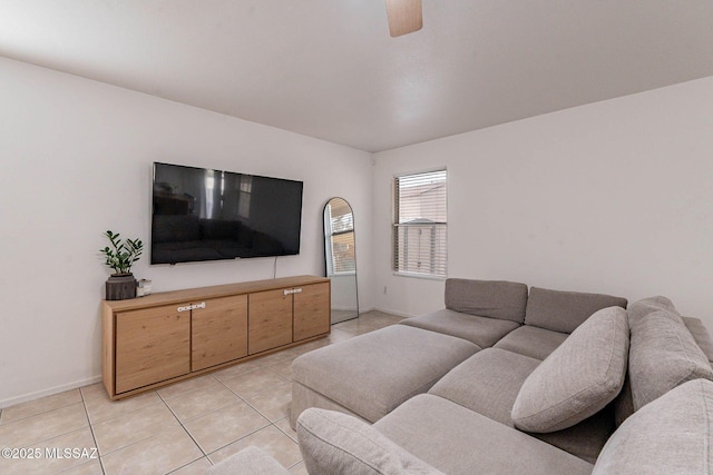 living room with ceiling fan and light tile patterned floors