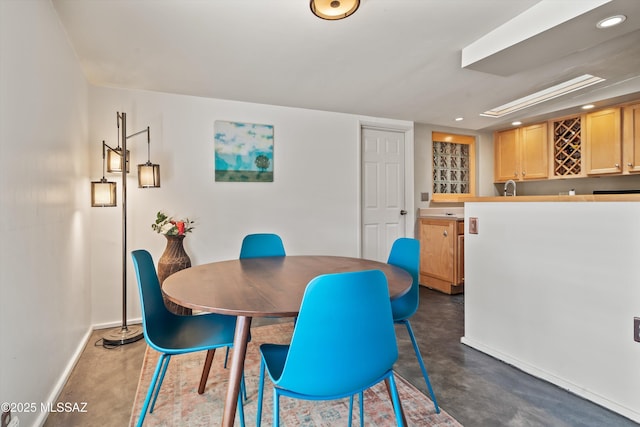 dining room featuring indoor wet bar