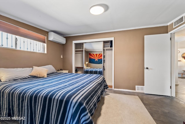 bedroom with finished concrete flooring, an AC wall unit, a closet, and visible vents