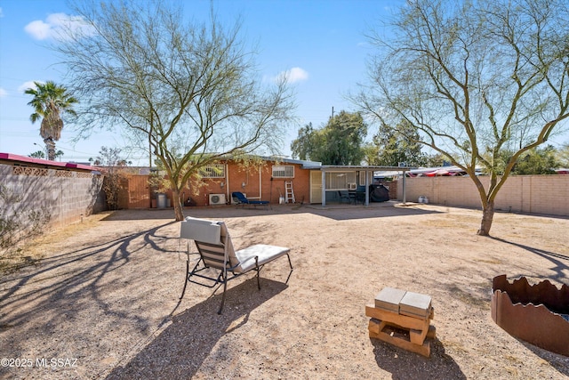 view of yard with a fenced backyard and a patio