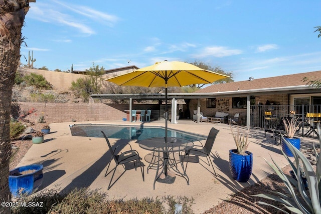 view of pool featuring a patio area