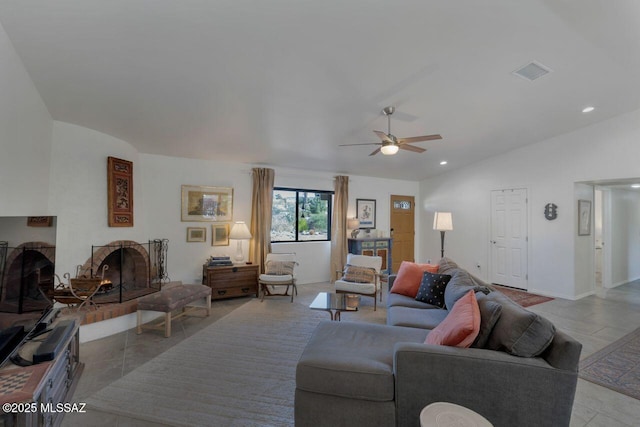 living room with ceiling fan and lofted ceiling