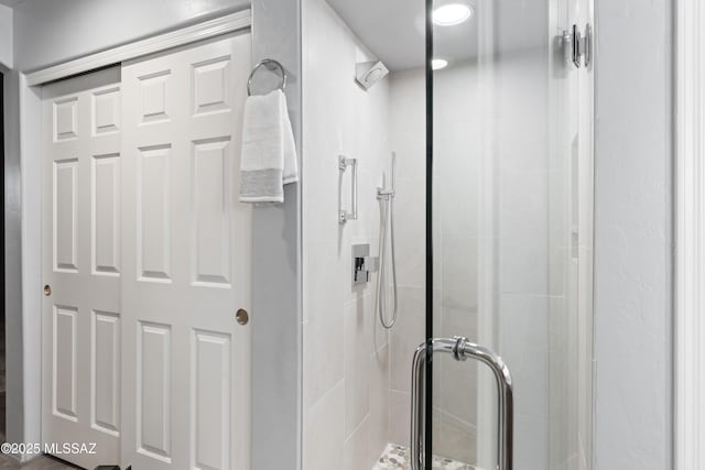 bathroom with an enclosed shower