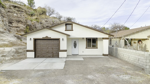 view of front of property featuring a garage