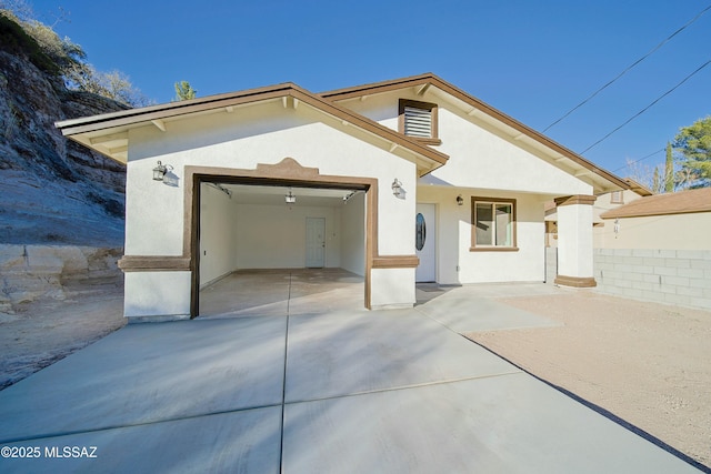 view of front of property with a garage