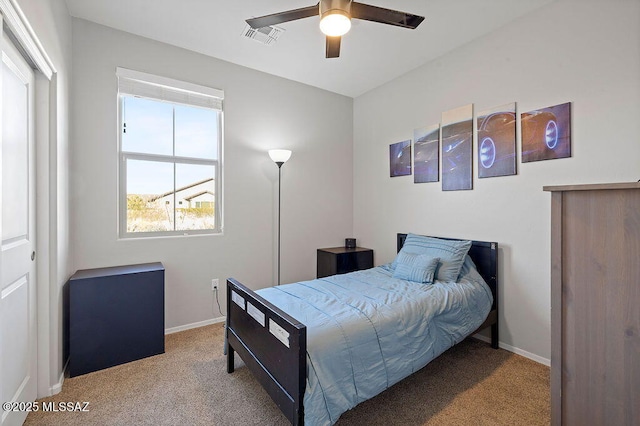 carpeted bedroom with ceiling fan