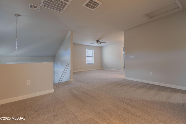 bonus room featuring ceiling fan and light carpet