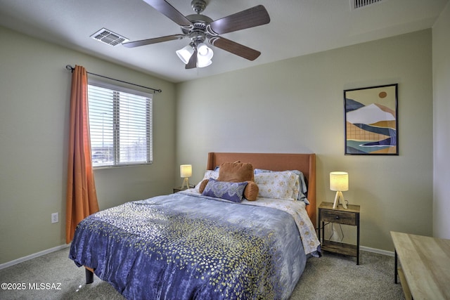 bedroom featuring light colored carpet and ceiling fan