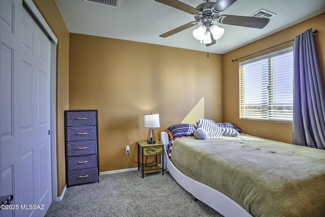 bedroom featuring carpet, ceiling fan, and a closet