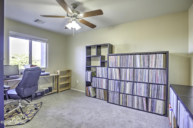 home office with carpet flooring and ceiling fan