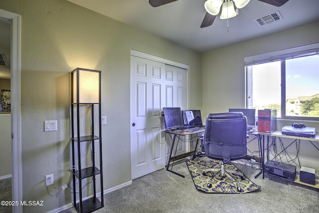 office space with ceiling fan and carpet floors