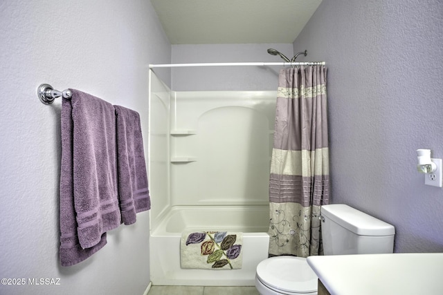 full bathroom featuring shower / bath combination with curtain, vanity, and toilet