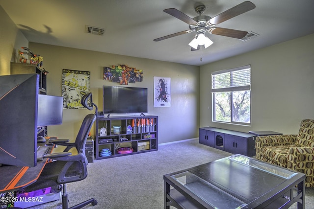 office area with ceiling fan and carpet flooring