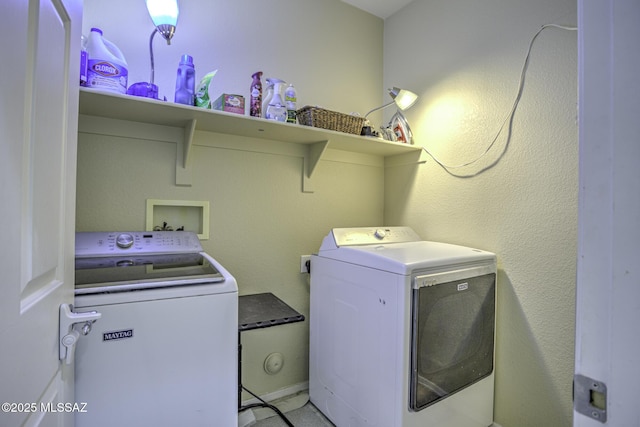 laundry room with washer and dryer