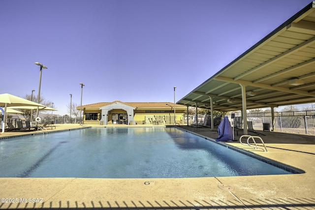 view of swimming pool featuring a patio