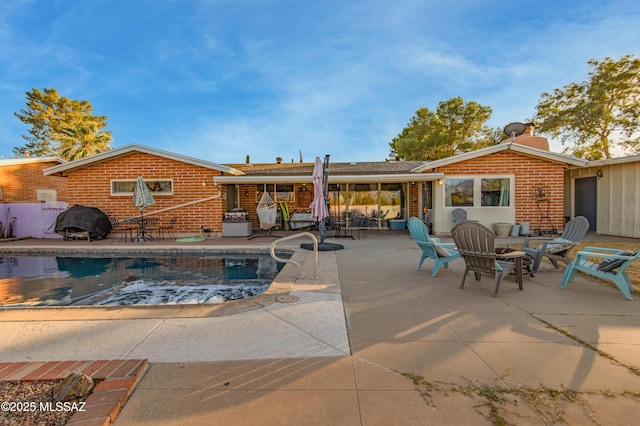 view of pool with a patio area