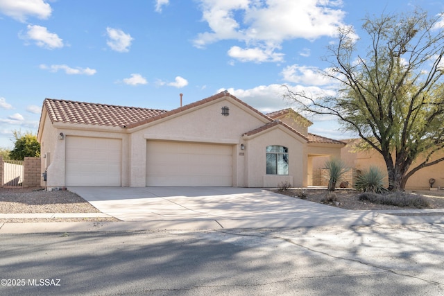 mediterranean / spanish-style house featuring a garage