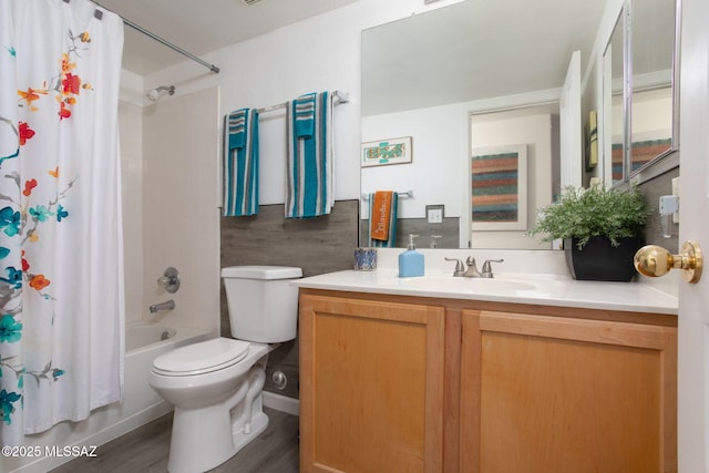 full bathroom featuring shower / bath combination with curtain, vanity, toilet, and wood-type flooring