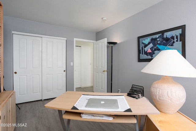 office space with wood-type flooring