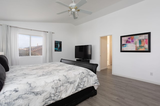 bedroom featuring lofted ceiling, dark hardwood / wood-style floors, and ceiling fan