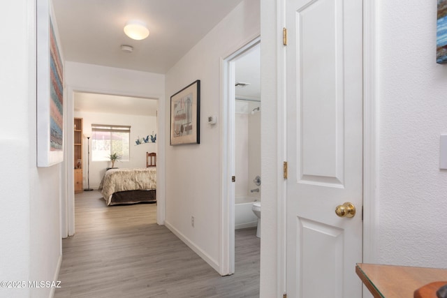 hallway featuring light wood-type flooring