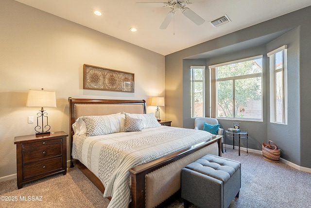 carpeted bedroom with ceiling fan