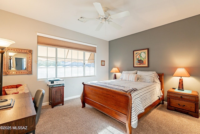 bedroom featuring light carpet and ceiling fan