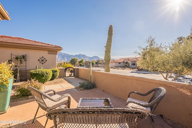 view of patio with a mountain view