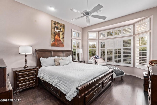 bedroom featuring dark hardwood / wood-style floors and ceiling fan