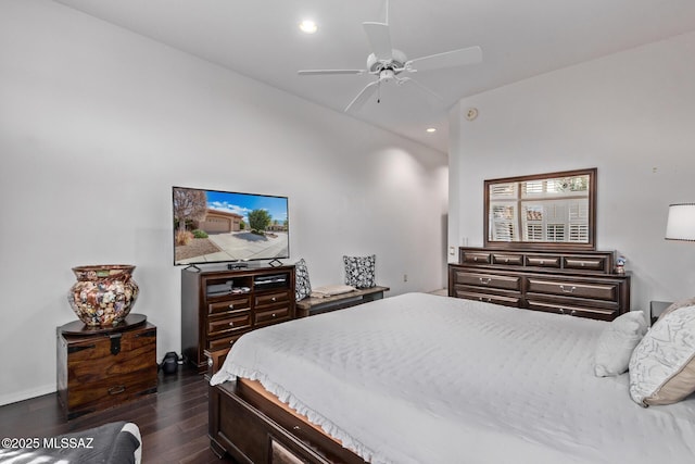 bedroom featuring dark hardwood / wood-style flooring and ceiling fan