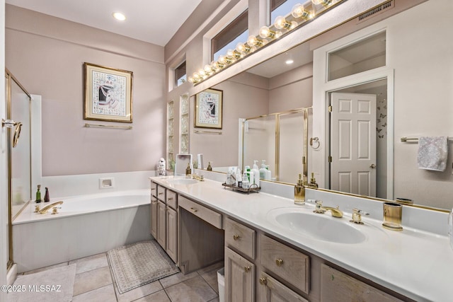 bathroom with vanity, tile patterned flooring, and separate shower and tub